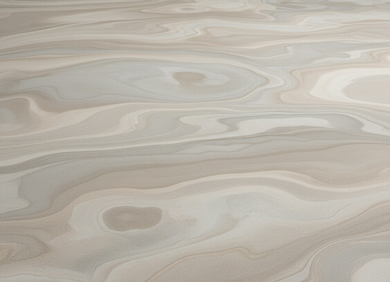 A floor with a swirling grey and brown pattern